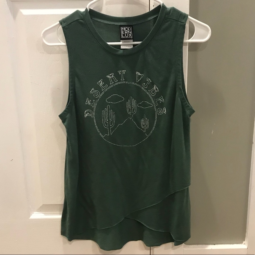 an olive green, sleeveless shirt